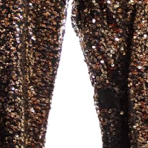 Fantastic pair of black joggers with gold sequins all over.